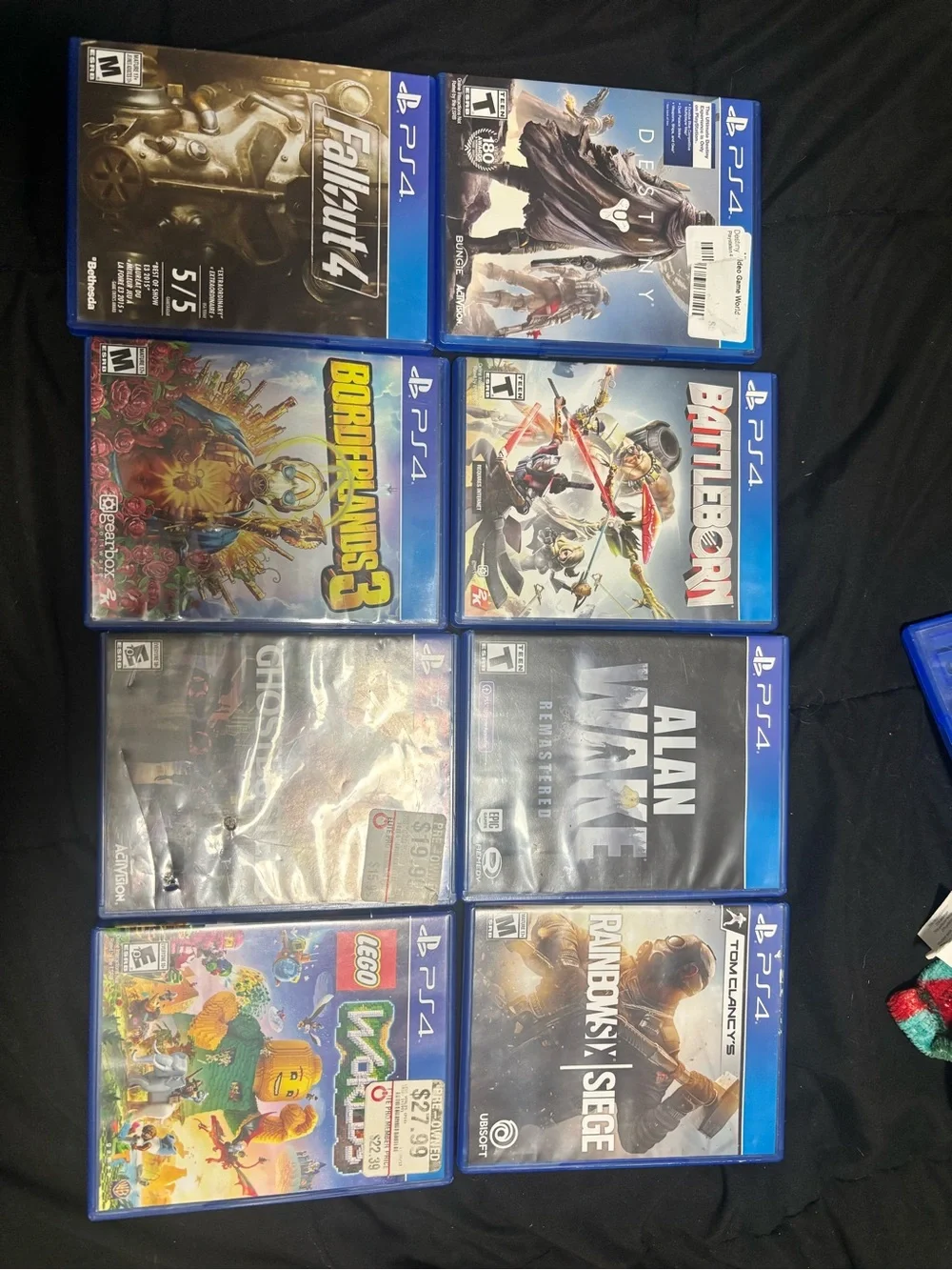 Sony 4 Game Bundle - Assorted Blue Case Collection
